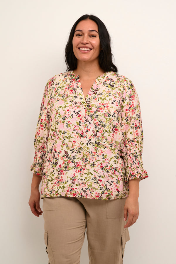 We are so excited to bring in a new plus size brand, KAFFE Curve